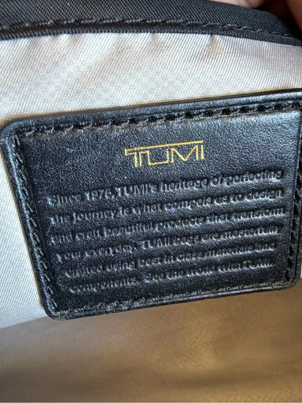 Tumi Black Duffel Bag with Gold Hardware